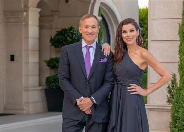 What is the age difference between Heather and Terry Dubrow?